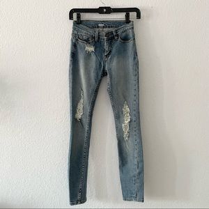 Urban Outfitters BDG Light-Medium Wash Mid-Rise Twig Distressed Skinny Jeans